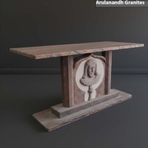 Granite altar table with cement-carved Christ relief
